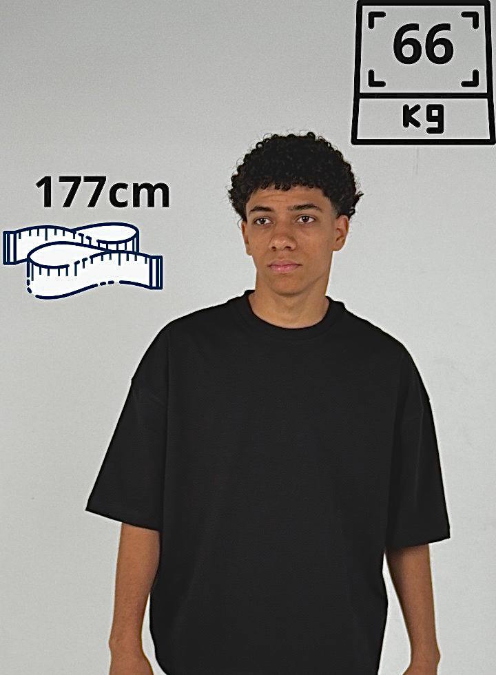 Person wearing a black t-shirt with height and weight measurements displayed on a gray background